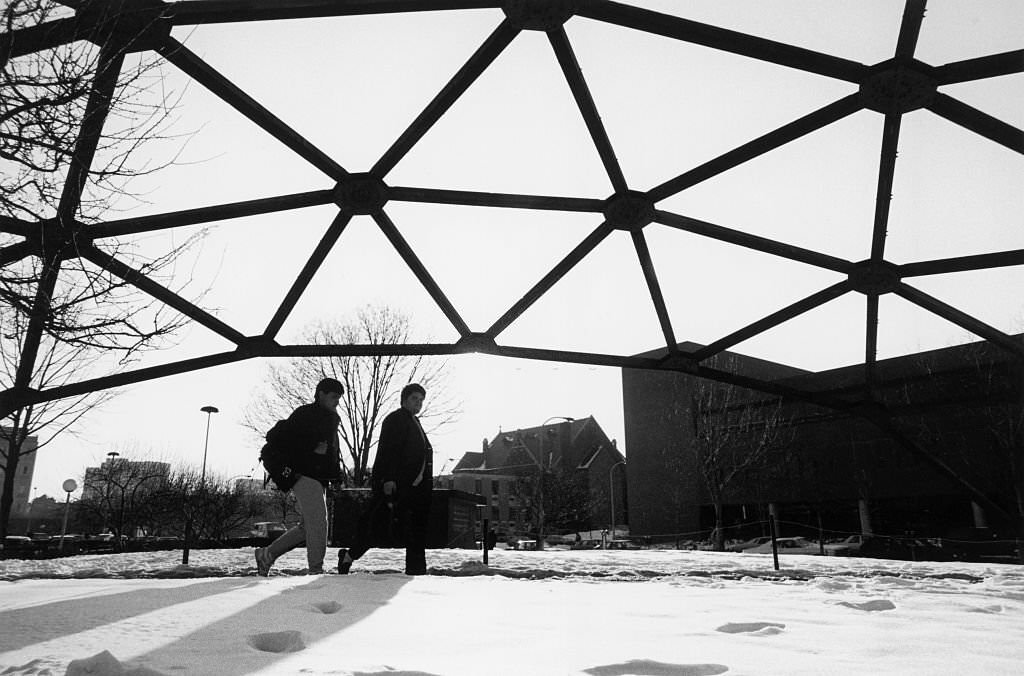 #35 Two male students walk through the winter snow on the campus of Drexel University.