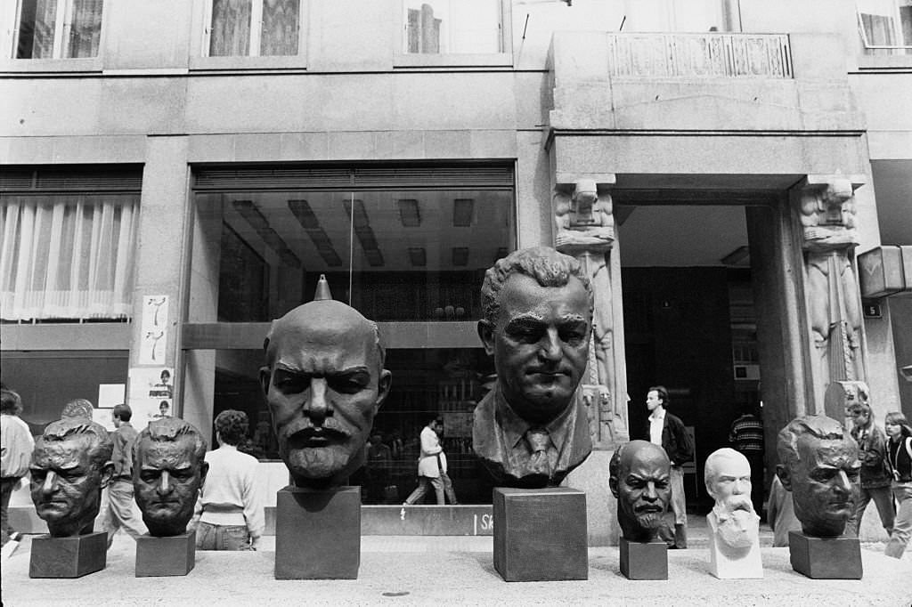 #27 Busts of Communist leaders Vladimir Lenin and Klement Gottwald for sale in Prague, Czechoslovakia, 1990.