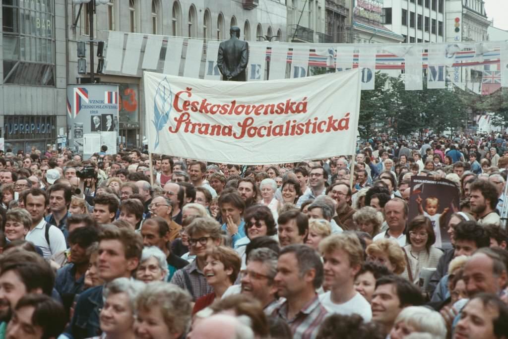#35 People attending a political rally in Prague, Czech Republic, June 1990.