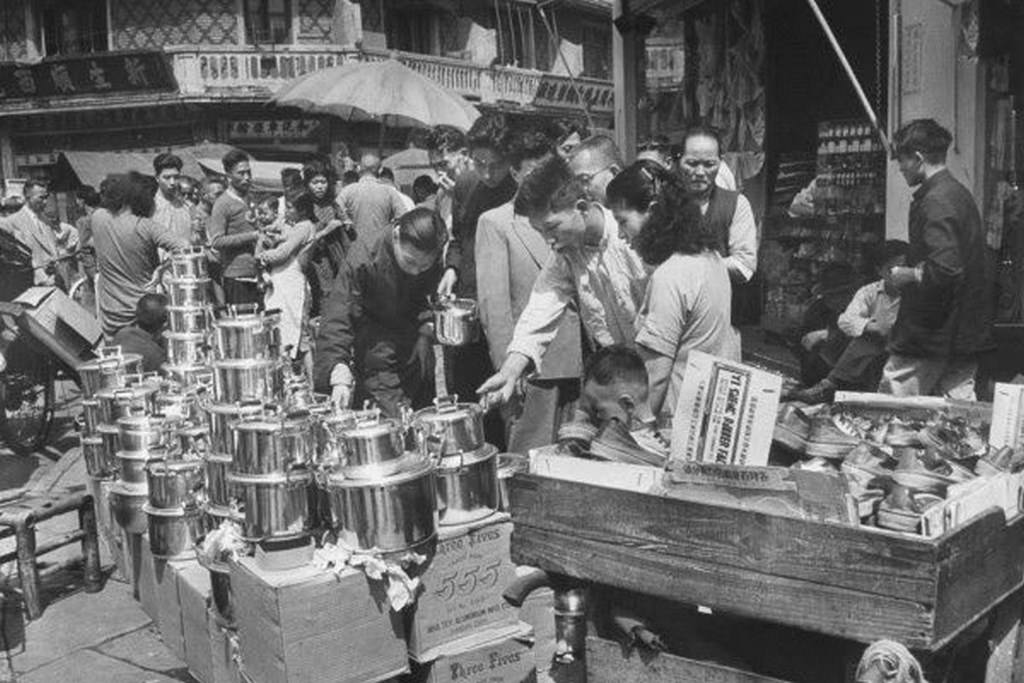 #105 The Shanghai market bazaar, vendors selling “555″ branded pots. Soon after on May 14, 1940s