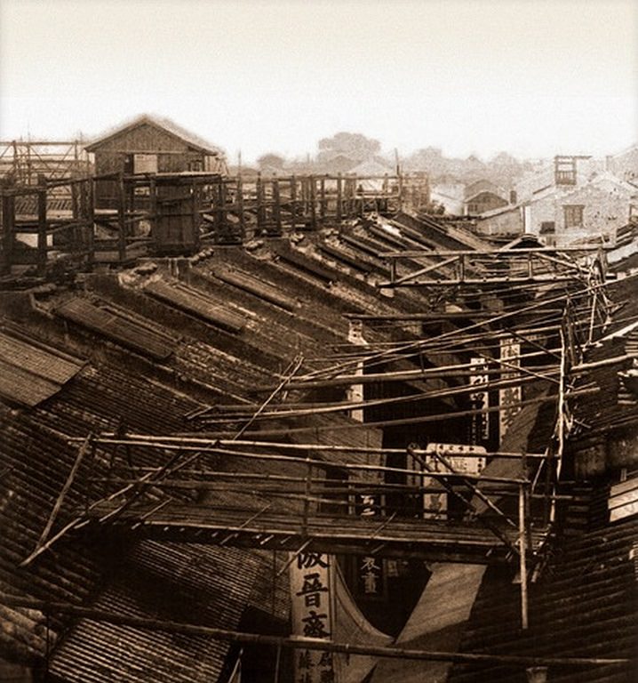 #28 Bridges by which the night police of the roofs cross the streets, Canton, China, 1900
