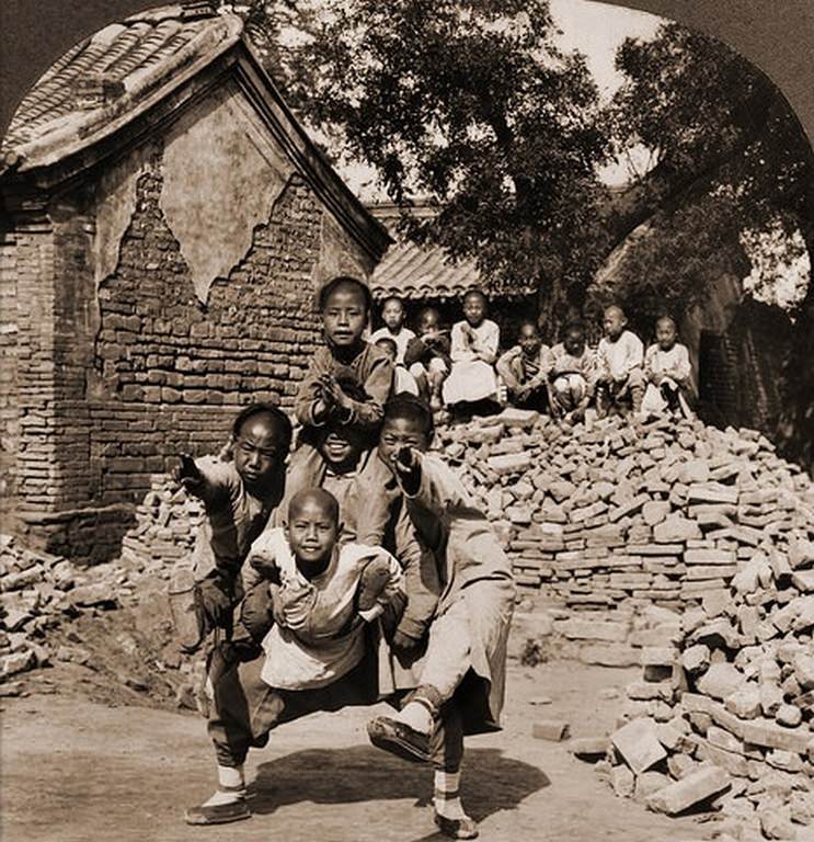 #31 Peking Mission School Children at Play, The Dragon’s Head, China, 1902