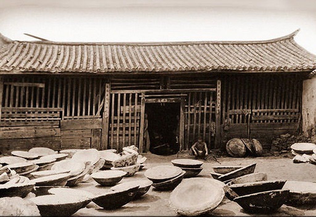 #65 Bowl Shaped objects Scattered Outside A Building, Yunnan, China, 1922