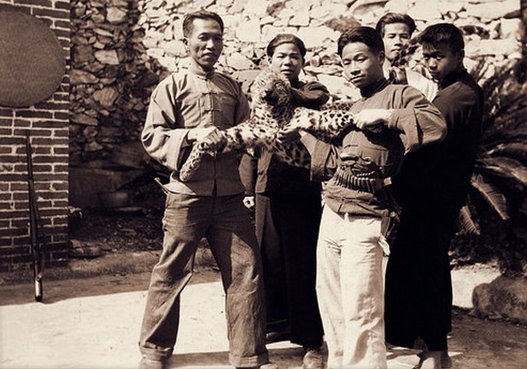 #83 Men With Leopard at the Dongan Mission, China, 1932