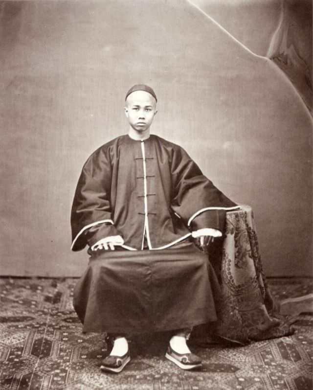 #30 A Cantonese man dressed for Chinese New Year, Canton, 1861