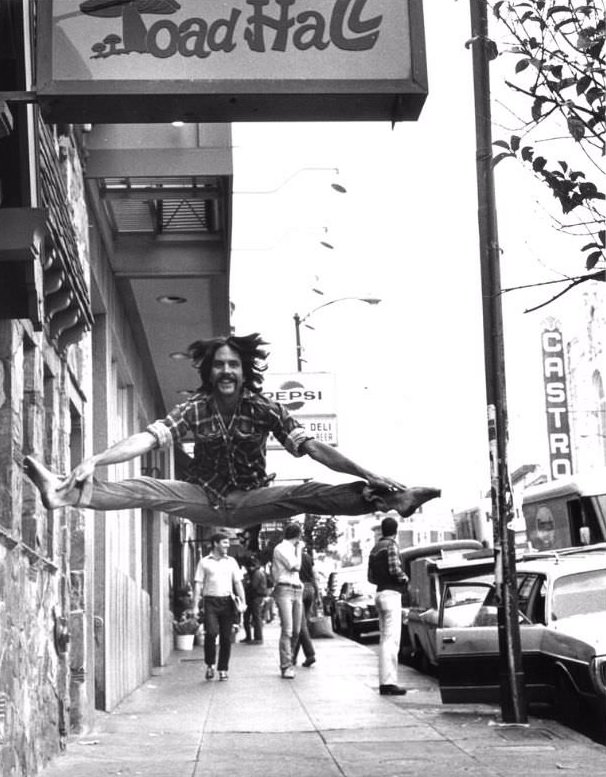 #30 Man leaping in front of Toad Hall, Castro Street, San Francisco, 1978