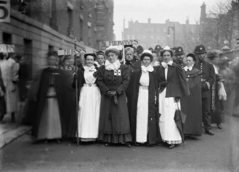 #4 Nurses and midwives from the Pageant of Women’s Trades and Professions marching to the Albert Hall, 1909