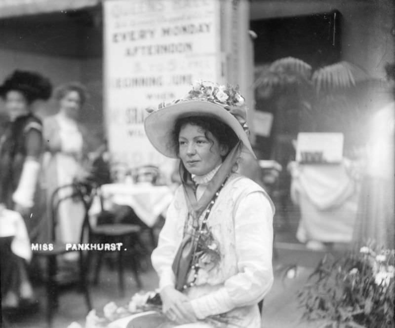 #7 Christabel Pankhurst, co-founder of the Women’s Social and Political Union (WSPU), inside the Women’s Exhibition, held at the Princes’ Skating Rink, Knightsbridge, 1909
