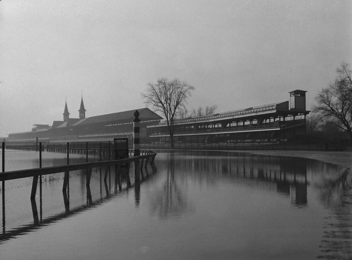 #5 Flood waters cover the track and infield at Louisville’s famous Churchill Downs racetrack, 1937.