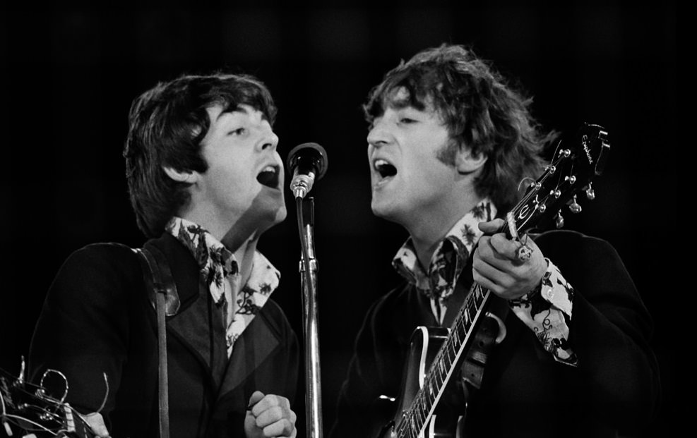 #18 Paul McCartney and John Lennon performing at the Beatles last concert at Candlestick Park in San Francisco, California, August 29 1966.