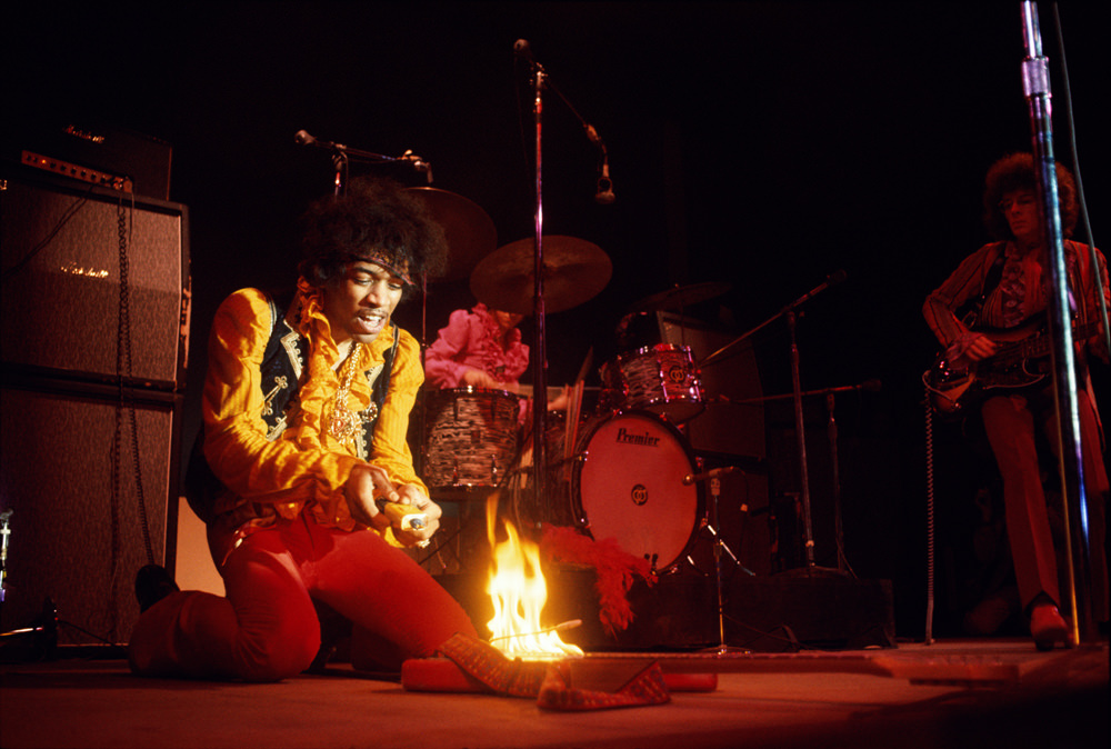 #19 Jimi Hendrix lighting his guitar on fire on stage at Monterey International Pop Festival Monterey, California, June 1967.