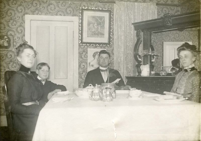 #6 Family seated at dining room table