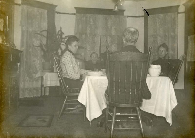 #7 Family seated in dining room