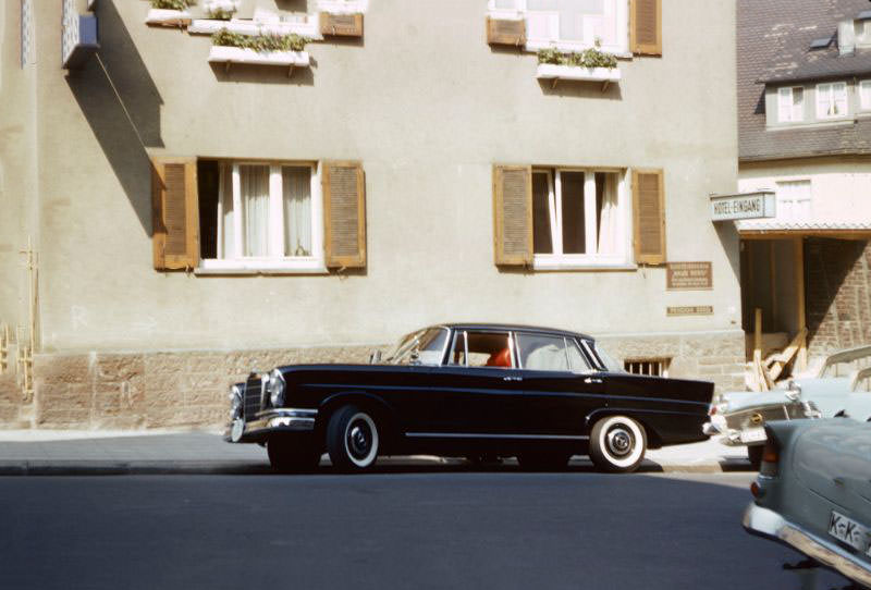 #83 The Mercedes 220 parked in front of Haus Berg, a hotel in Stuttgart, 1960s