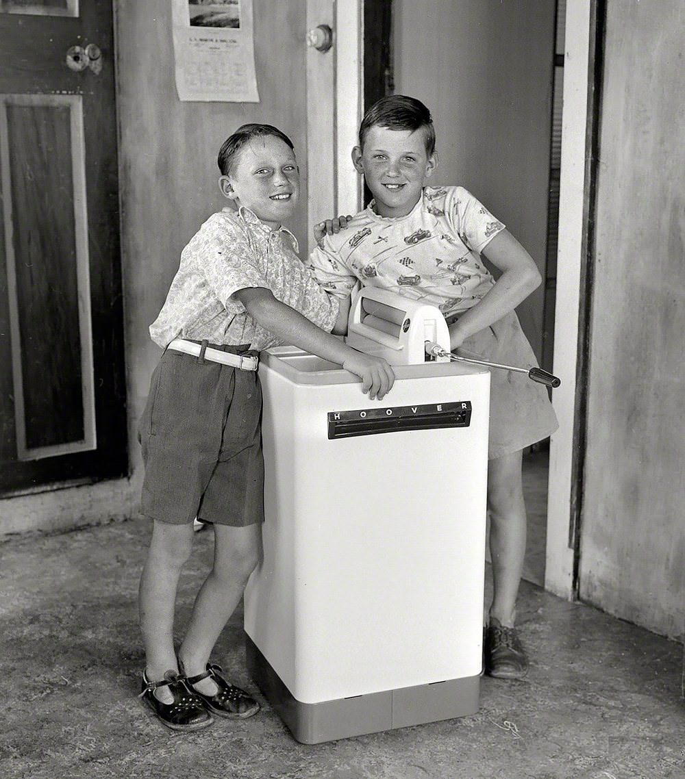 #15 Anthony and Paul Banks with a Hoover washing machine, Wellington, New Zealand, 1956