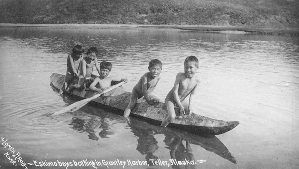 #26 Eskimo boys on a kayak in Grantley Harbor.