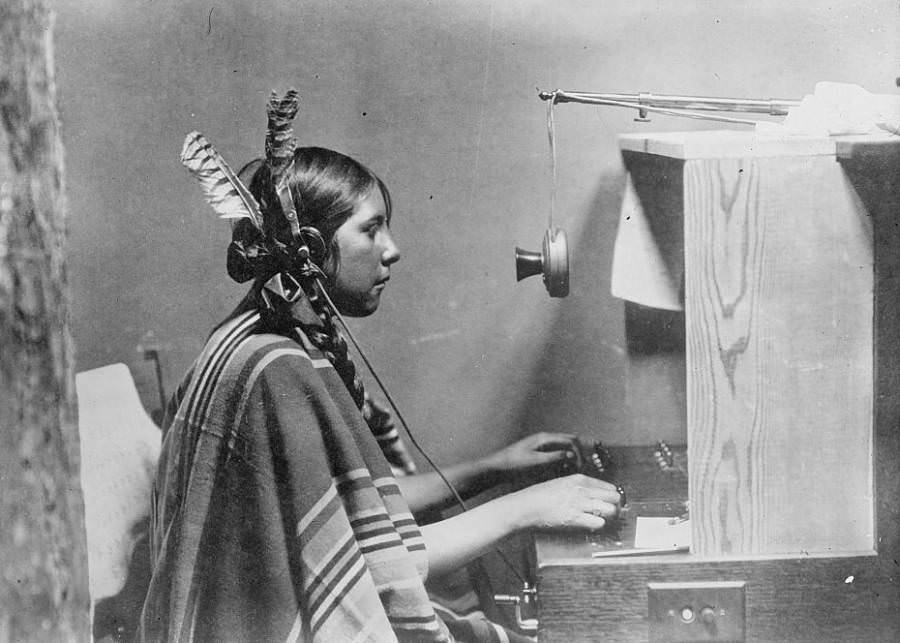 A Native American telephone switchboard operator sits at work at Montana’s Many Glacier Hotel on June 26, 1925.