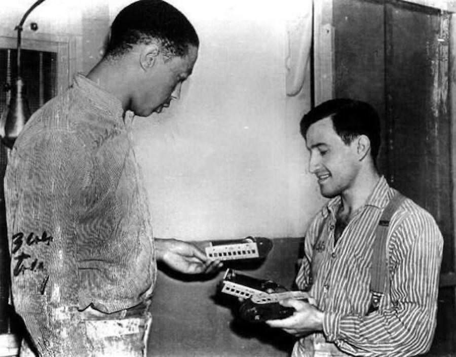 #72 Joe Arridy gives his toy train to another inmate before he’s taken to the gas chamber in 1939. Called by the warden “the happiest prisoner on death row,” Arridy had an IQ of 46.