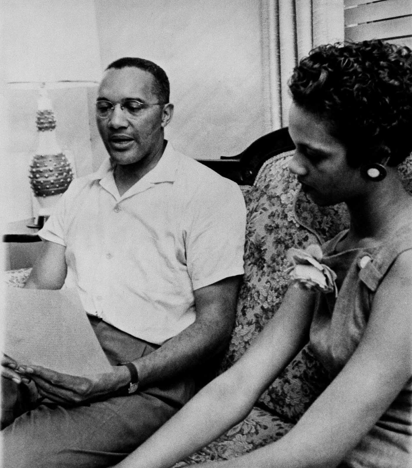 #10 Counts and her father, Rev. H.L. Counts, are interviewed at home after her withdrawal from Harding High School.