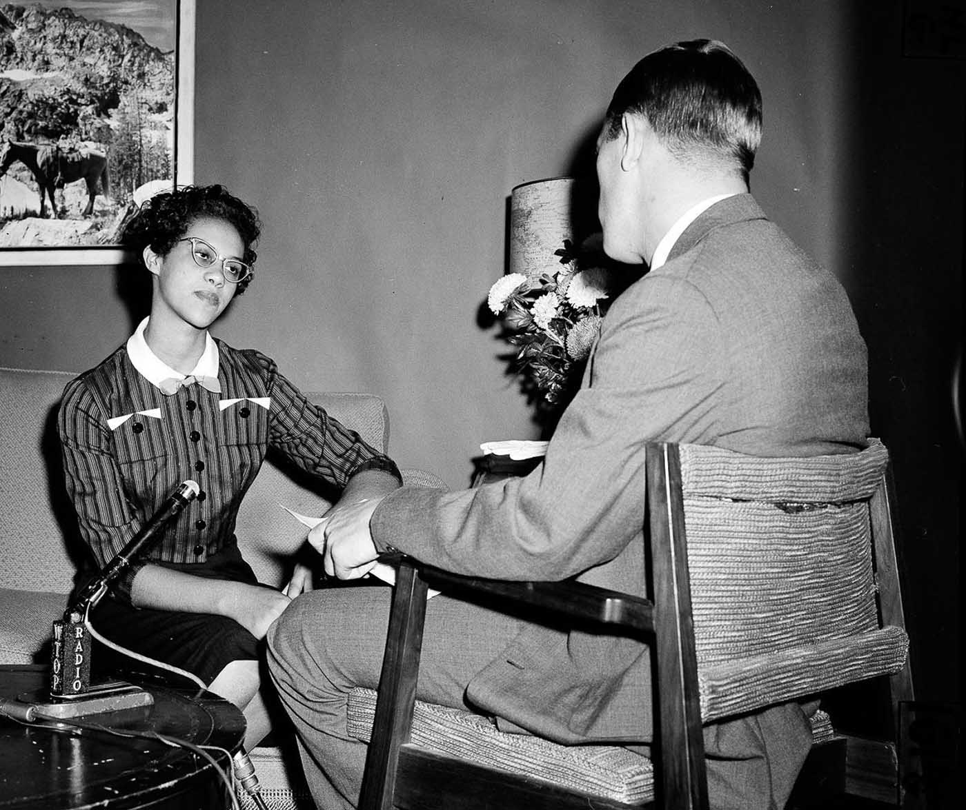 #9 Counts is interviewed by a reporter after pulling out of Harding High School..