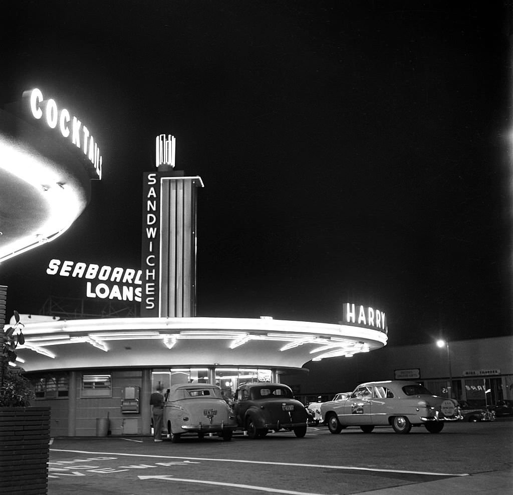 #23 Cars park outside Harry Carpenter’s Drive-in Restaurant on the southeast corner of Sunset and Vine in Los Angeles, 1949