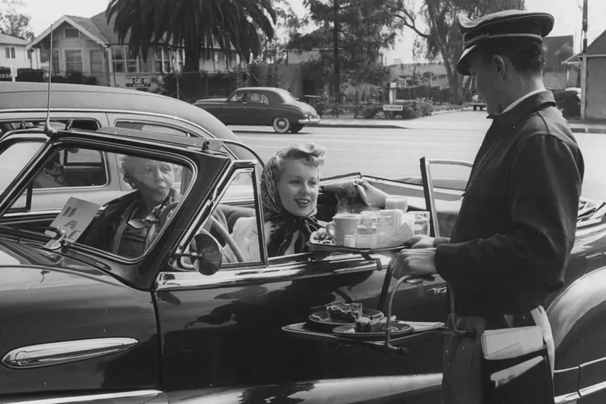 #59 Drive-ins didn’t only serve burgers and fries. Depending on where you went, you could get a full dinner or just a steaming coffee in a mug. 1950s.
