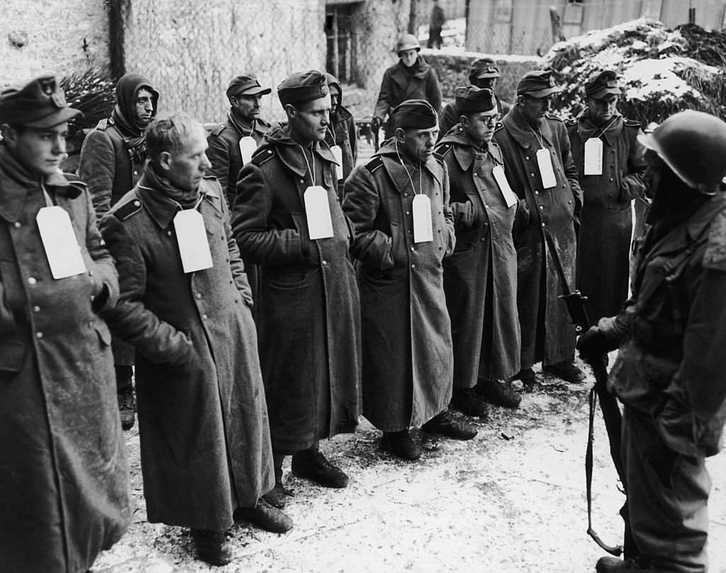 #13 Captured German troops, including members of the SS and Luftwaffe, and volunteers from Poland and Czechoslovakia, during World War II, 1st June 1945.