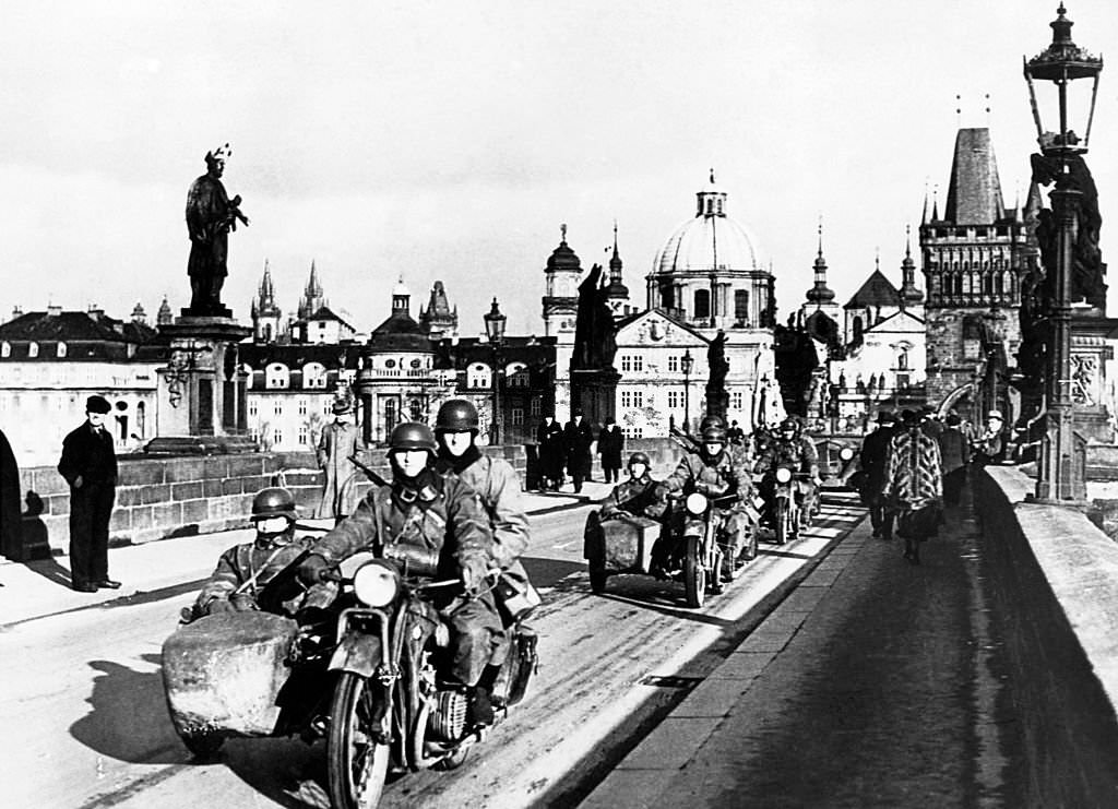 #50 The German Army enters Prague with a procession of motorcycles in March 1939, several months prior to the commencement of the European War.