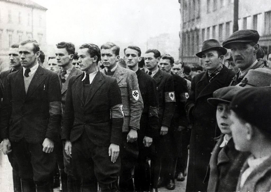 #58 The Hlinka Guards displaying German armbands near the Town Hall.