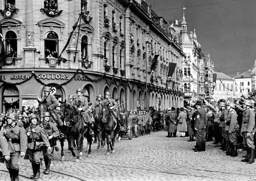 #65 The German propaganda picture shows German troops marching into Reichenberg, Sudetenland (today Liberec, Czech Republic) in October 1938.