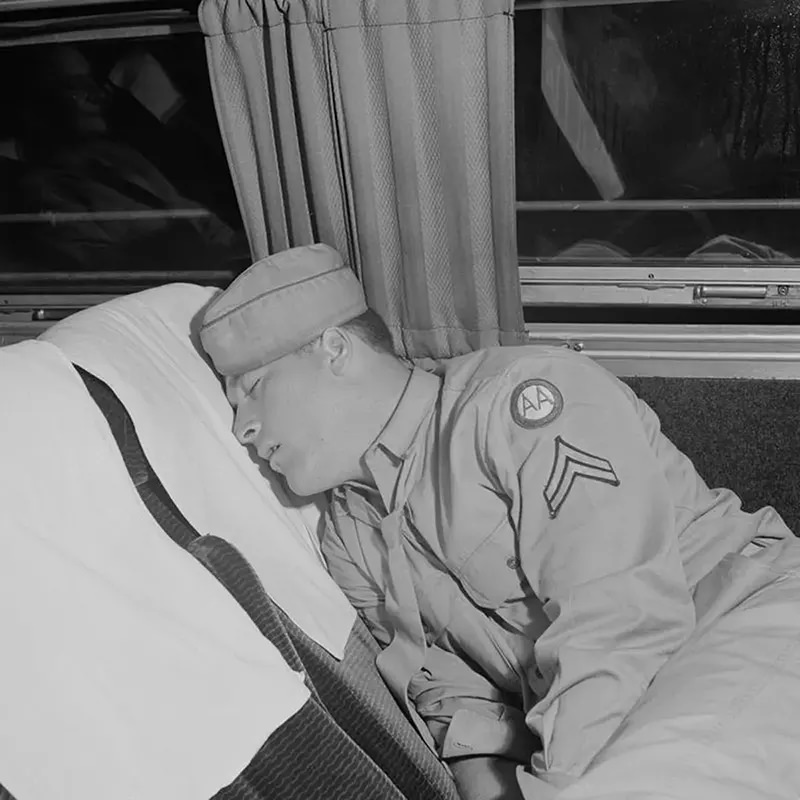 #10 A soldier sleeps on a bus from Cincinnati to Louisville.