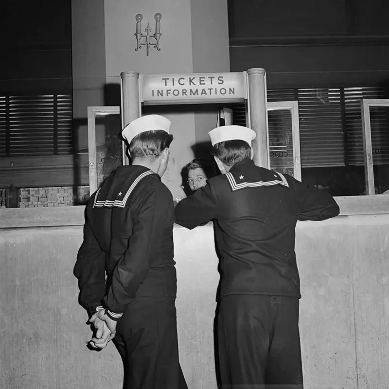 #11 Sailors purchase Greyhound tickets in Chicago.