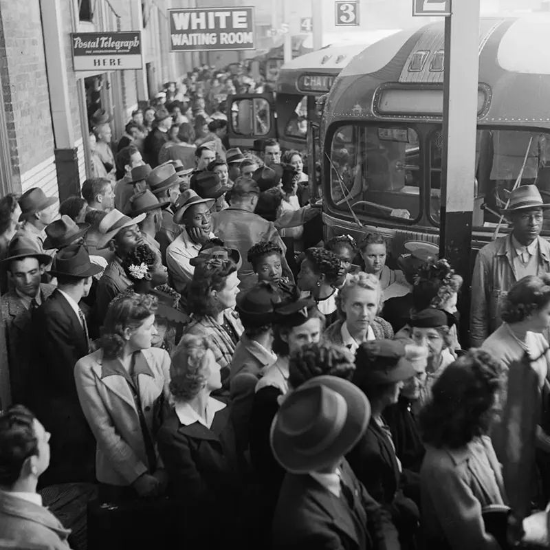 #17 Passengers board buses at the Memphis Greyhound station.