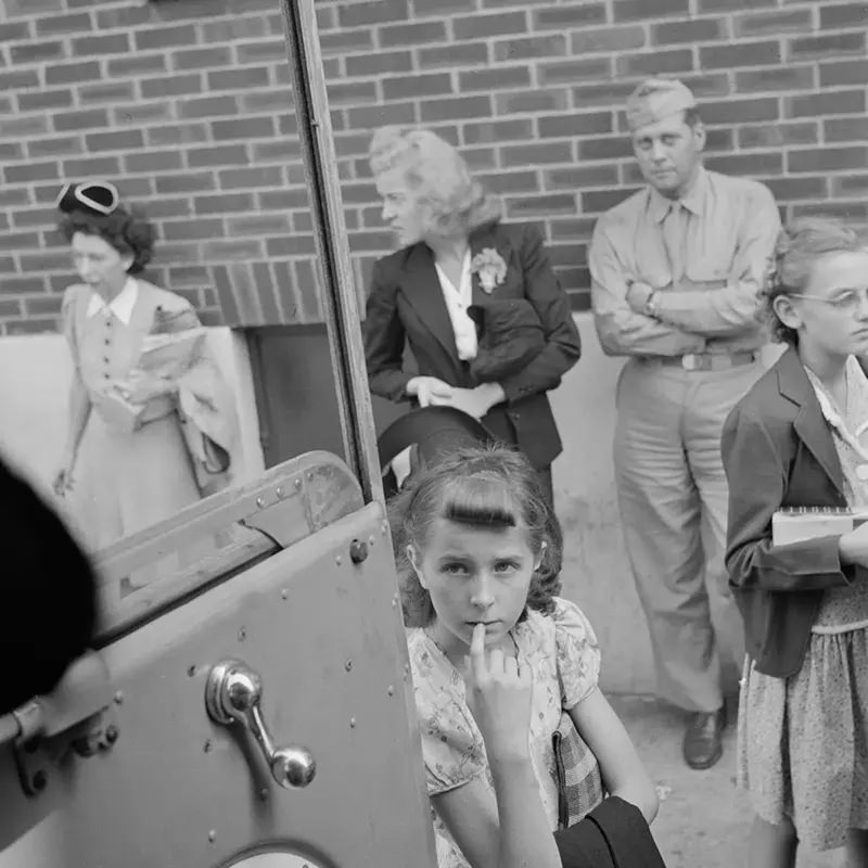 #2 Passengers wait to board a Greyhound bus at a small town in Pennsylvania.