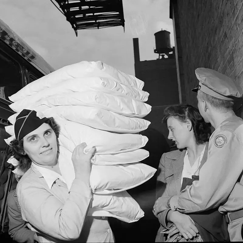 #23 A pillow girl at the Greyhound terminal in Chicago.