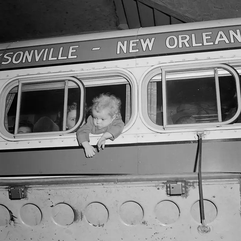 #32 A young passenger on a Tennessee Coach Company bus in Knoxville.