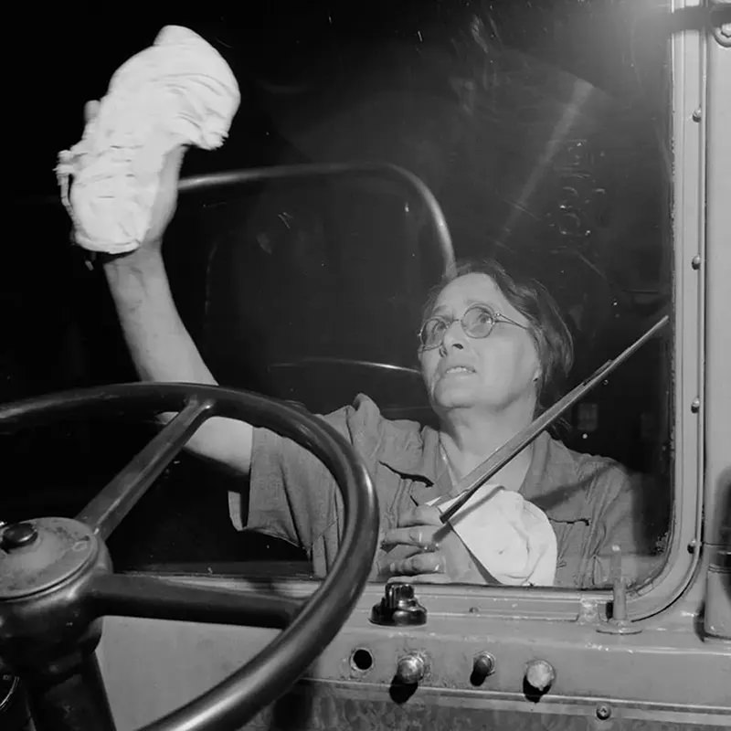 #39 A worker cleans the windshield of a bus at the Greyhound garage in Pittsburgh.