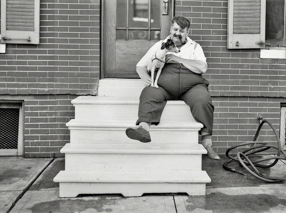 #17 Men with his dog, Baltimore, July 1938