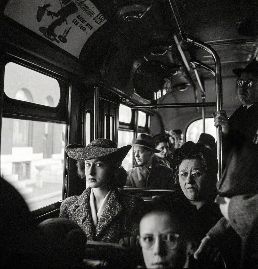 #60 Baltimore, Maryland. Crowded bus carrying people to work, Baltimore, April 1943