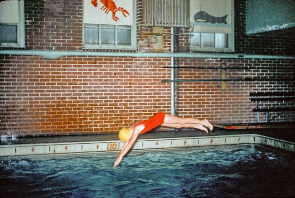#71 A women diving in swimming pool, Baltimore, 1961