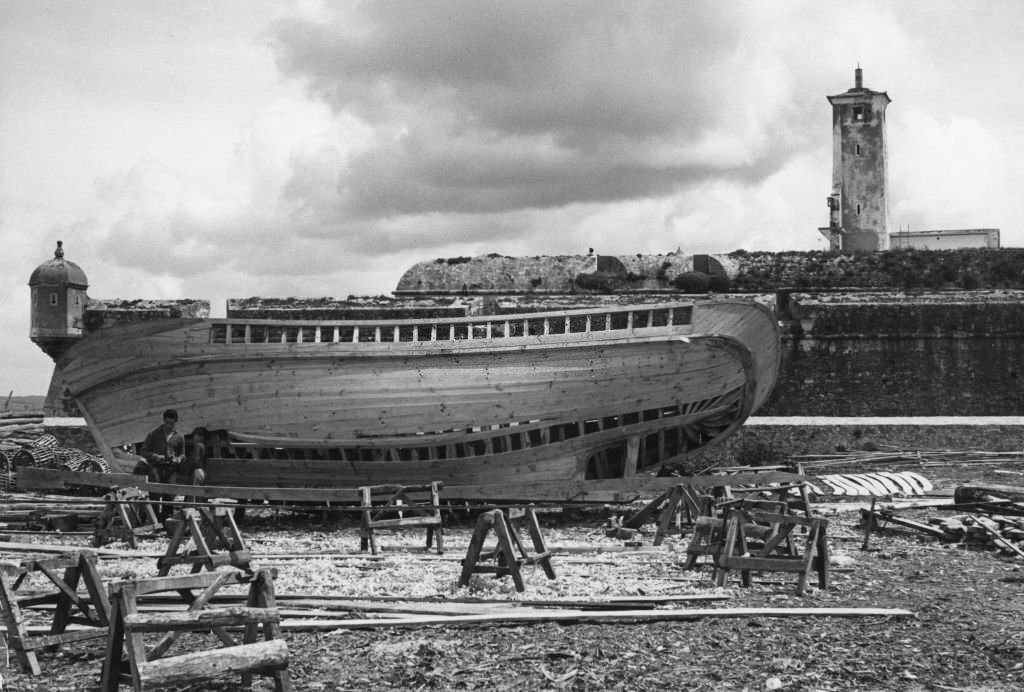 #4 Construction of a fishing boat in Portugal a beach near Nazaré, Portugal, 1956.