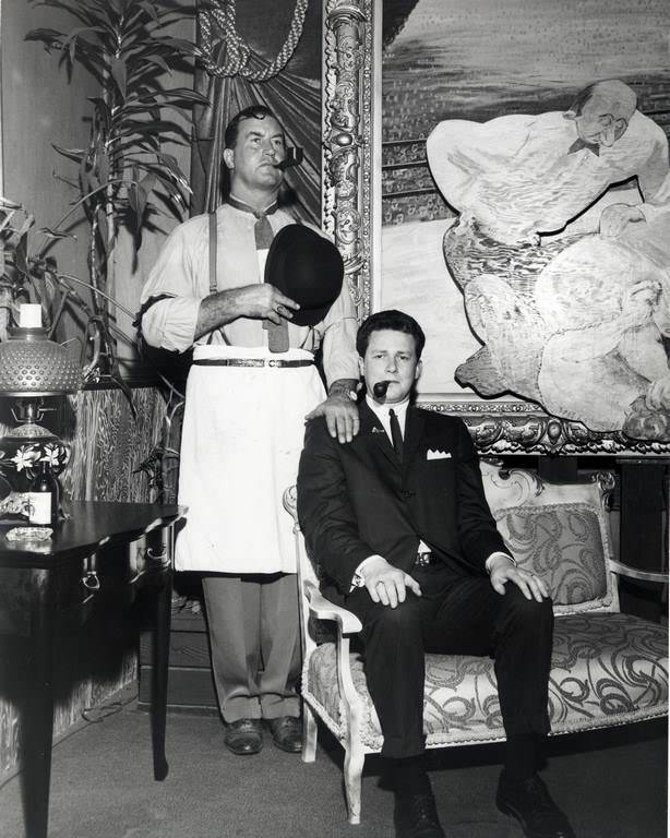 #130 Ben Sharpe poses with his brother Mike, seated, 1953