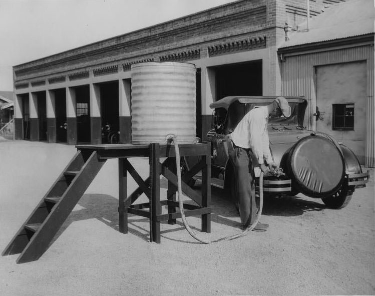 #19 Pumping gas from a barrel, San Jose, 1930