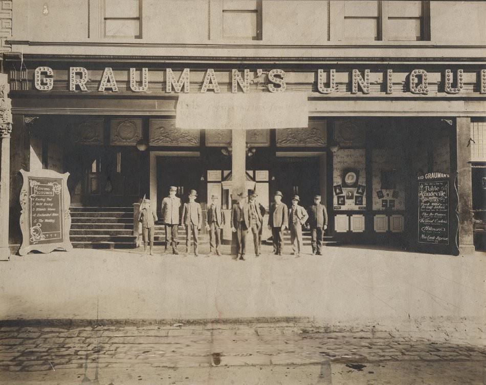 #26 Men in front of Grauman’s Unique Theatre, 1904