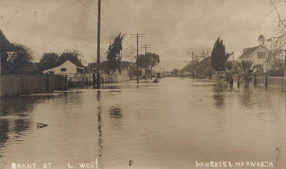 #29 Near First Street, San Jose (California), sowing the standing water across the entire street, 1911