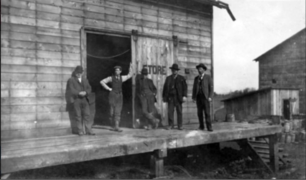 #2 Five Men Stand Outside a Store, 1930s