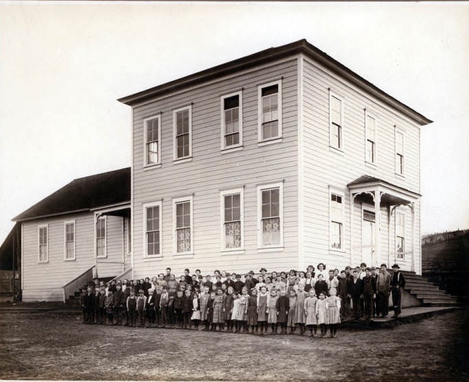 #10 Students gather outside for a photograph at Harney school in Vancouver, 1932