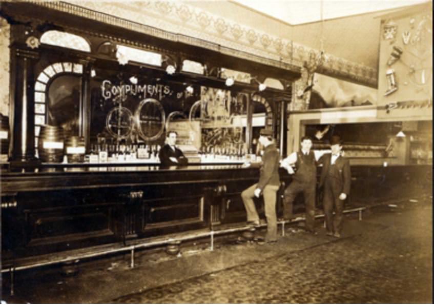 #13 William Shoenig behind the bar at the Lehthle Saloon located at 502 Main Street in Vancouver, 1930s
