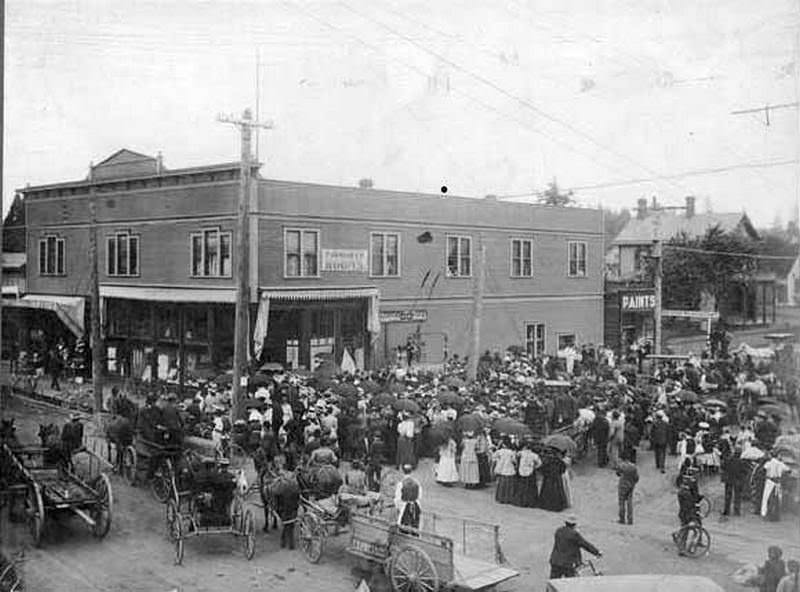 #16 A event taking place at the Carter & Carter Store at 8th and Main in Vancouver. At left is the small store Great Western & Co, 1880s