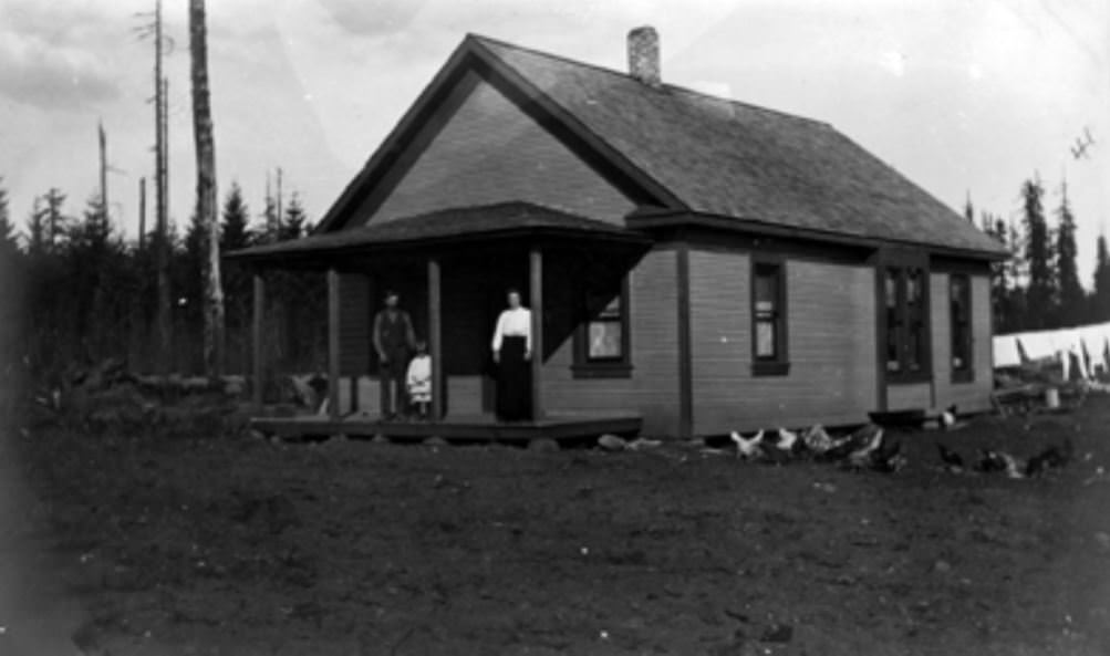 #43 The Lindley family stands outside the G.W. Lindley home in Vancouver, Washington, 1900s